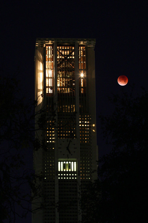 Eclipsed moon by UCR Carillon Tower